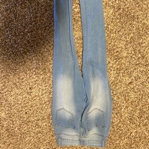 Light wash High waisted ripped fashion nova jeans
